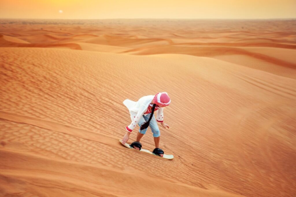 sandboarding in Dubai desert